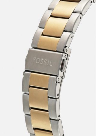 Reloj Fossil bicolor dorado y plateado