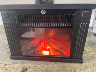Calefactor imitación chimenea con efecto fuego