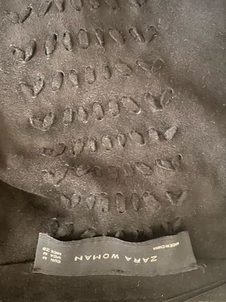 Chaqueta Negra con Flecos