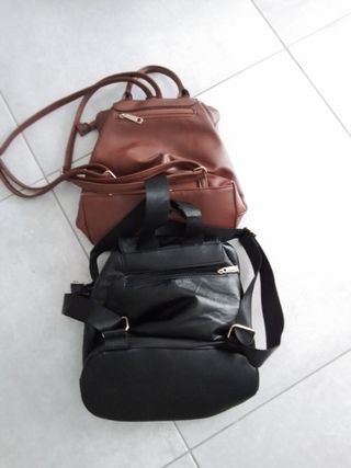 2 Mochilas Gusachi Marrón y Negra