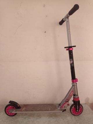 Patinete Oxelo rosa y plateado
