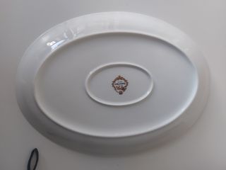 Fuente ovalada blanca de porcelana