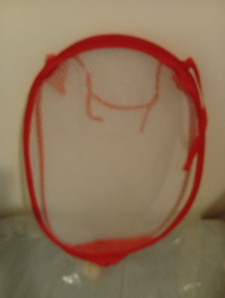 Portabiancheria pieghevole rosso e bianco