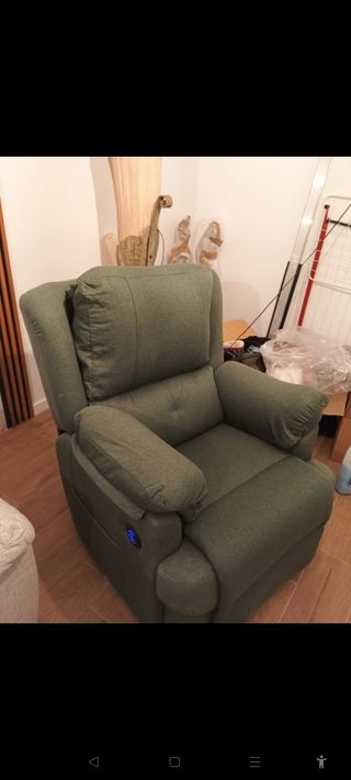 Sillón orejero verde