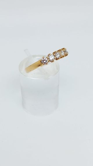L735 Anillo oro 18k 5 circonitas brillantes