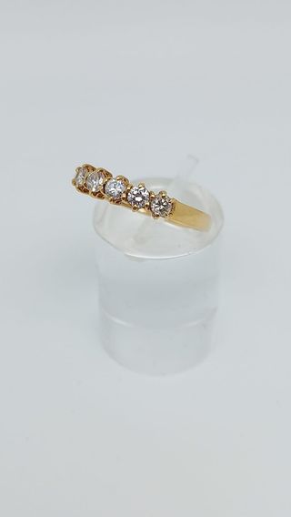 L735 Anillo oro 18k 5 circonitas brillantes