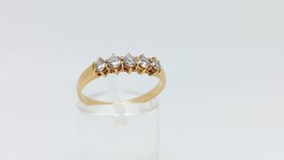 L735 Anillo oro 18k 5 circonitas brillantes