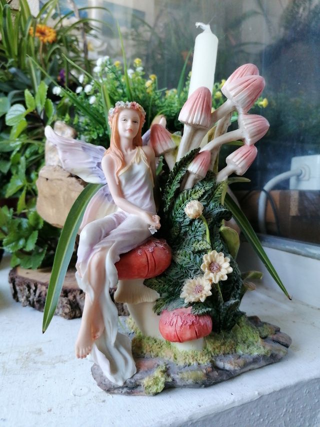 Hada porta vela con setas