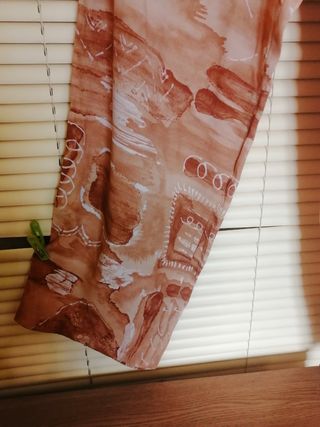 Pantalón ancho estampado arena