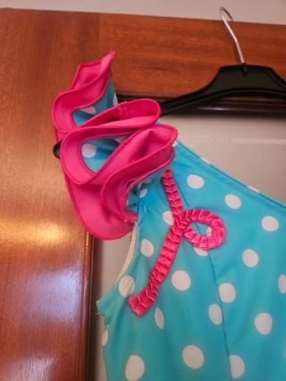 Traje de flamenca verde turquesa, detalles fucsia