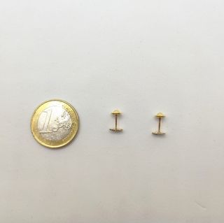 Pendiente Niña de oro de 18k circonitas, 0.33 g.