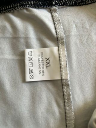 Pantalones pitillo negros con mariposa