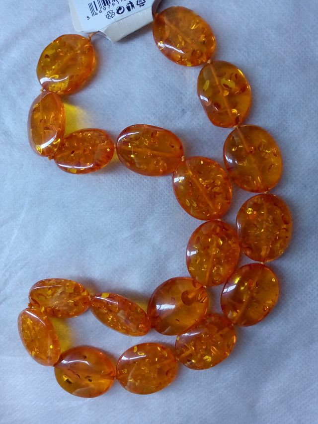 Collana resina arancione nuova