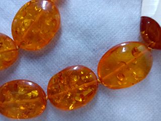 Collana resina arancione nuova