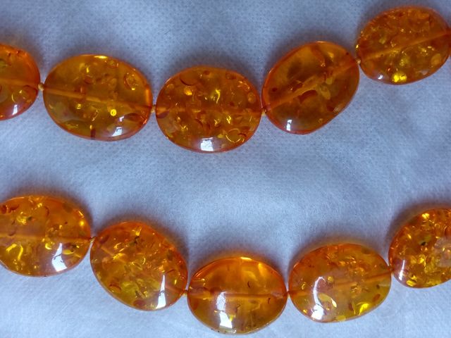 Collana resina arancione nuova