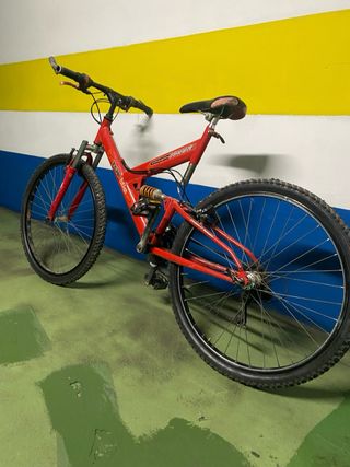 Bicicleta de montaña juvenil doble suspensión