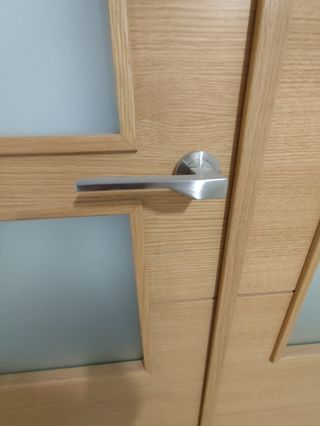 Puerta individual y doble de roble con cristalera