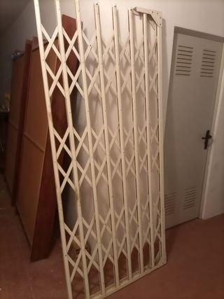 Reja de tijera metálica plegable