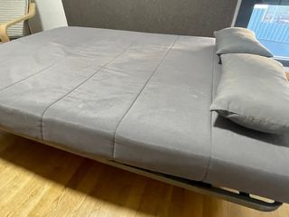 Sofá cama gris con canapé