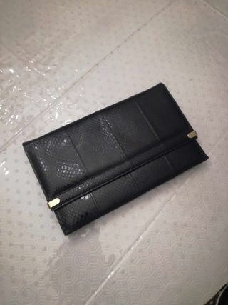 Pochete em pele preta