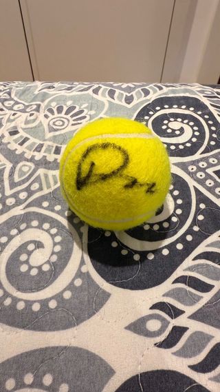 Pelota de tenis firmada por Draper