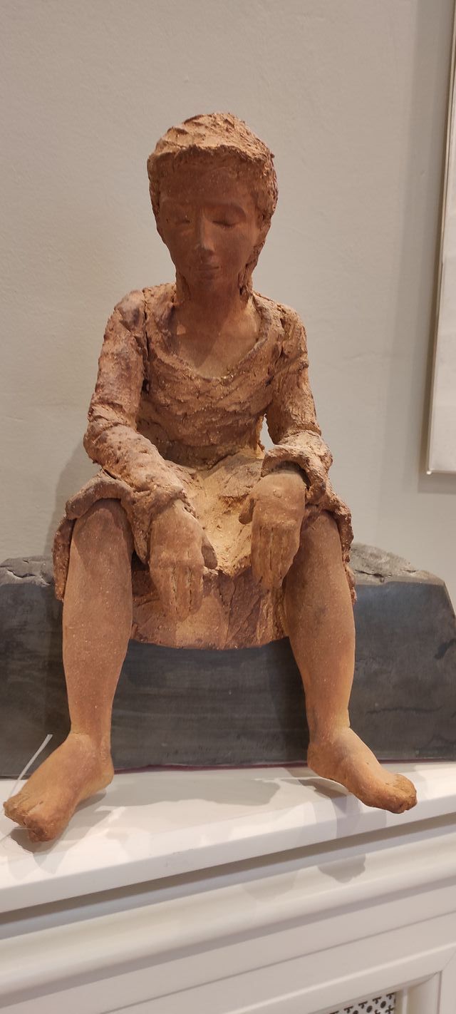 Escultura de terracota y piedra