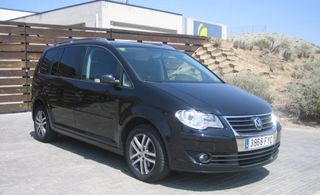 Guantera, espejos y varias piezas VW Touran negro 