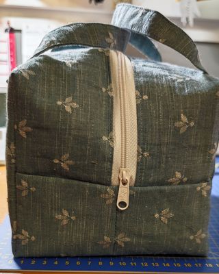 Neceser Azul con Estampado flor de lis.
