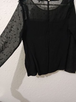 Blusa negra con estrellas