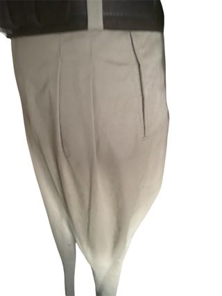 Pantalón elegante con pinzas beige