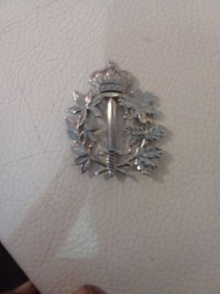 Medalla corona y espada