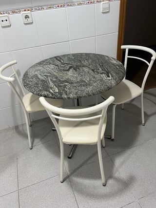 Mesa de cocina redonda mármol y metal