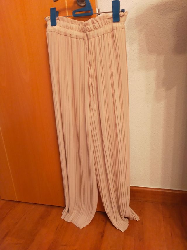 Pantalón ancho plisado beige