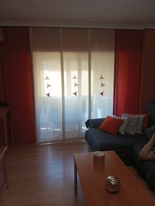Cortina lateral con estores japoneses