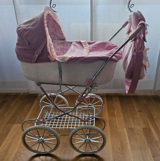 Carrito de bebé de juguete con bolso y manoplas