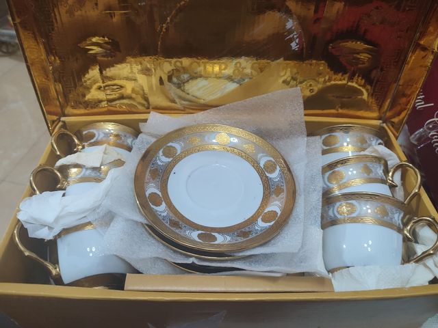 Juego de tazas de café de porcelana y metal