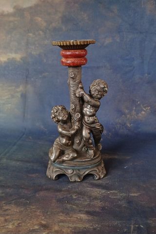Portacandele vintage con putti in metallo