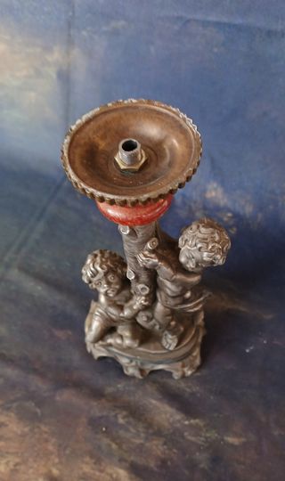 Portacandele vintage con putti in metallo