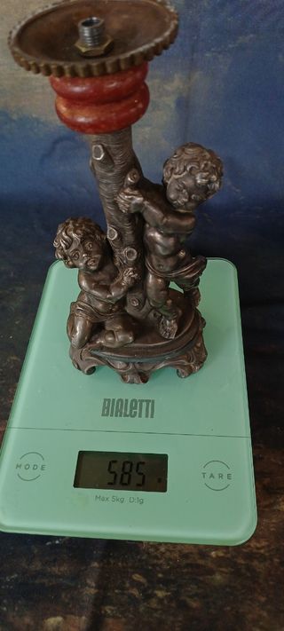 Portacandele vintage con putti in metallo