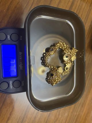 Pulsera Bismarck oro con piedras negras y blancas