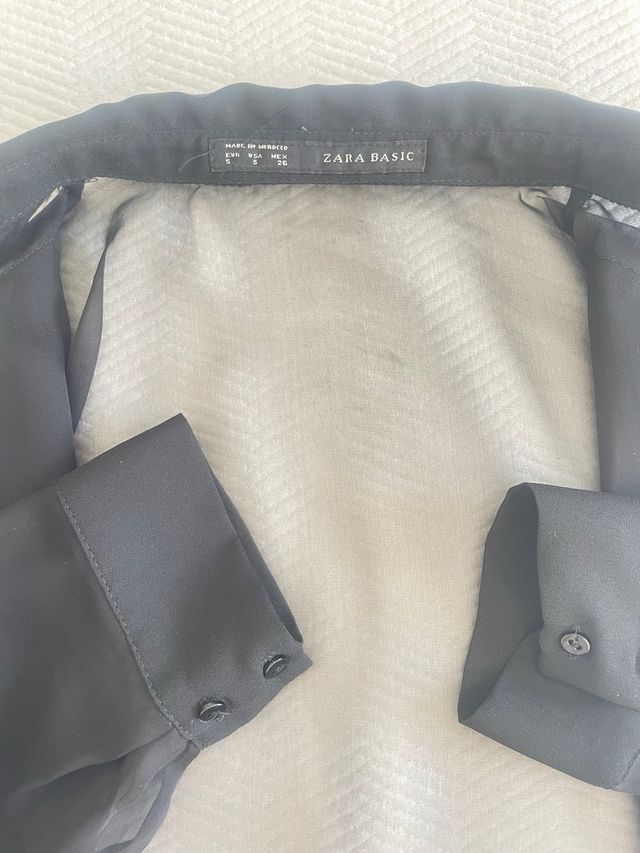 Blusa transparente negra