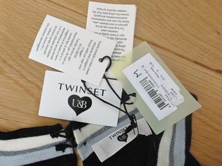 Vestito Twinset nero con fantasia geometrica.