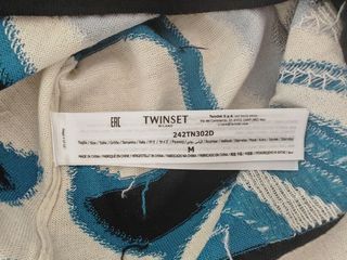 Vestito Twinset nero con fantasia geometrica.