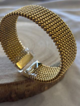 Pulsera de acero inoxidable dorada
