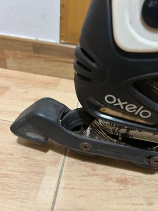 Patines Oxelo Negro Talla 42 más protecciones.