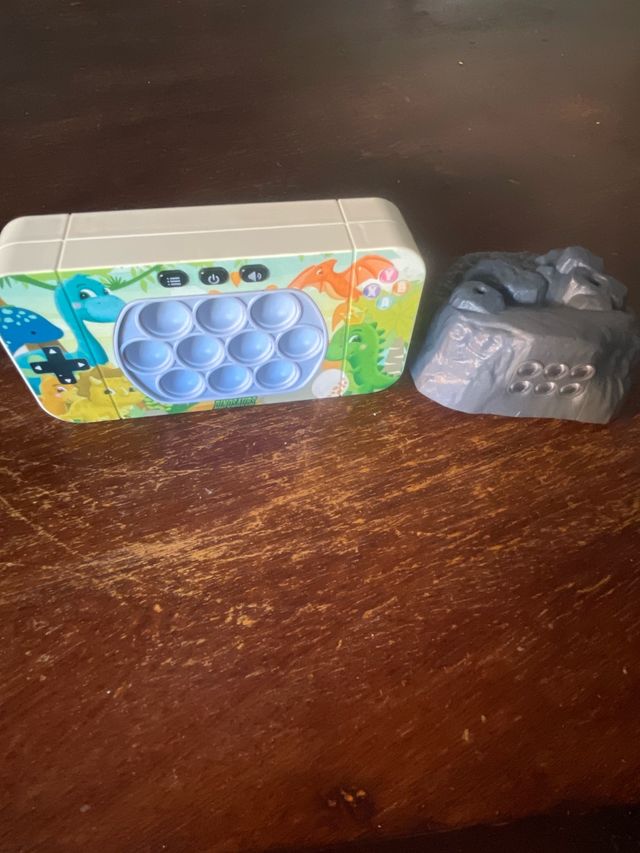 Juguete interactivo de dinosaurios