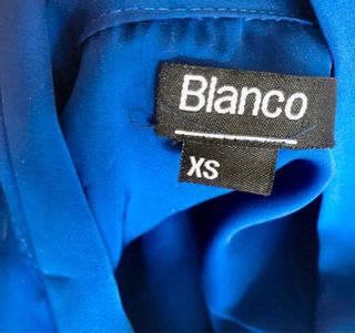 Blusa azul con lazada al cuello Talla XS