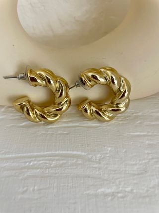 Aros dorados trenzados Zara