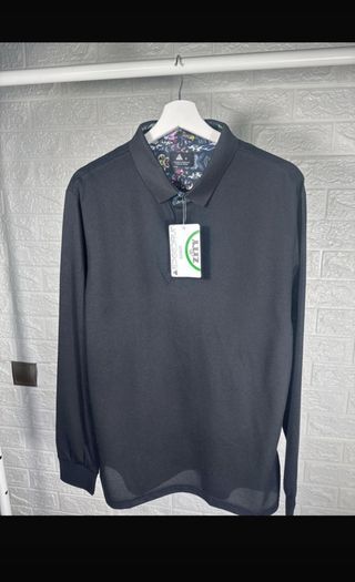 Polo negro manga larga hombre