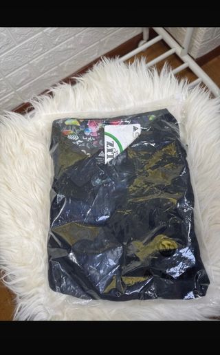 Polo negro manga larga hombre